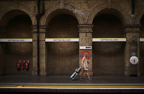 Travelers, Notting Hill Gate subway station, underground, tube, public transport, London, England,