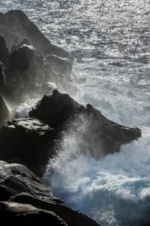 Thundering surf from the Atlantic Ocean on the rocky coast in San Sebastian, Basque Country, Spain