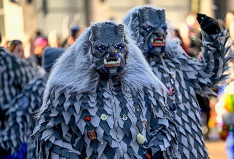 Members of a fools' guild in traditional Haes, fools' clothes, during the carnival procession in