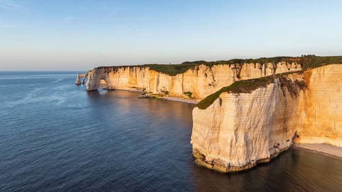 Aerial view, panorama of the distinctive Pointe de la Courtine ledge in the evening sun, then the