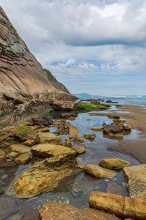 Distinctive rock cliffs as a geological formation of rock layers, Flysch on Itzurun Beach in