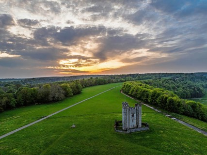Sunset over Hiorne's Tower from a drone, Arundel, West Sussex, England, United Kingdom