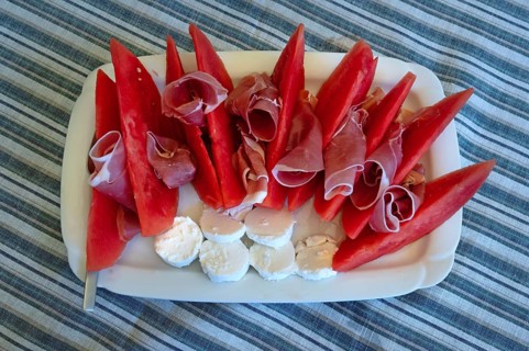 Sliced watermelon with ham and sheep cheese served on a platter, Bavaria, Germany