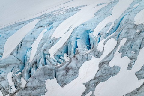 Blue rugged glacier ice with crevasses and snow, detail, Exit Glacier, Kenai Peninsula, Alaska, USA