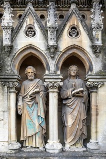 Stone statues of saints Luke and John, parish church of St John the Baptist, Frome, Somerset,