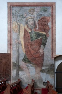 Monumental wall painting of Saint Christopher, created around 1515, St. Michael Collegiate Church,
