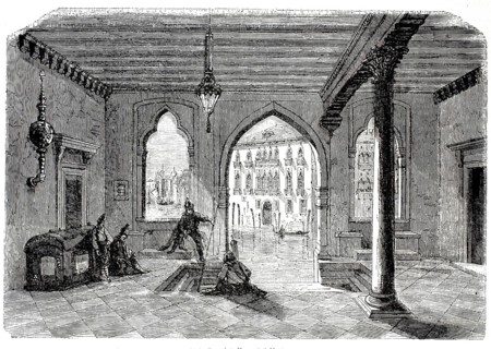 Atrium of Palazzo Foscari in Venice with Gothic architectural elements and figures in the