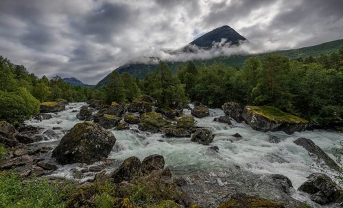 Torrential mountain stream, low-hanging clouds, Valldøla, Valldal, Norway