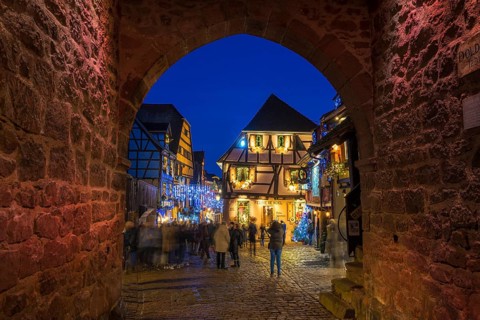 Colour-illuminated and Christmassy decorated half-timbered houses, blue hour, Christmas market,