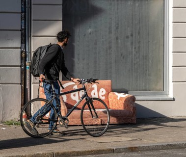 Garbage parked on public roads, couch in orange, Neue Schönholzer Straße, Berlin, Germany