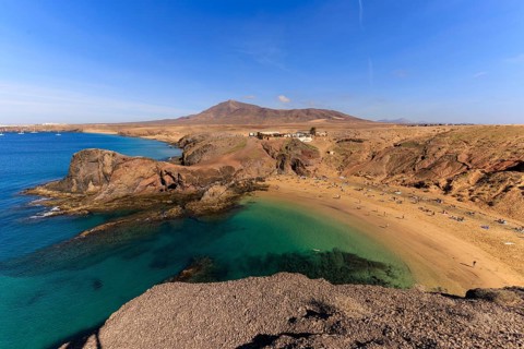 Lanzarote, Canary Islands, Spain, Europe, Playas de las Papagayo, A sunlit beach with turquoise