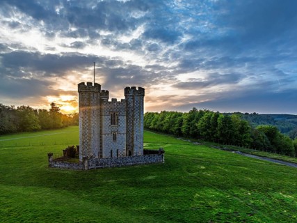 Sunset over Hiorne's Tower from a drone, Arundel, West Sussex, England, United Kingdom