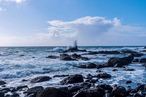 A wave breaks on a rock in the stormy Atlantic off Alojera, La Gomera, Spain