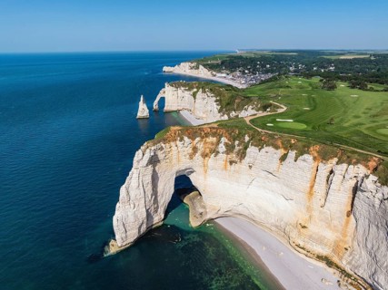 Aerial view of the rock gate La Manneporte rock gate behind the Porte d'Aval rock formation,