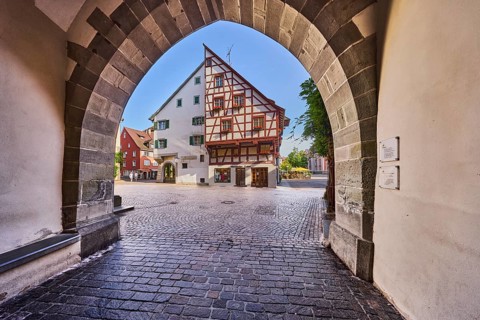 Archway, historic residential and commercial buildings, city gate, half-timbered house, square,