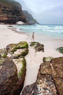 Young tourist on Diaz Beach, sandy beach at the Cape of Good Hope, Eastern Cape, South Africa