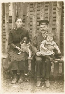 Farmer, man, woman, family, dog, child, poverty, happiness, family photo with parents, child and