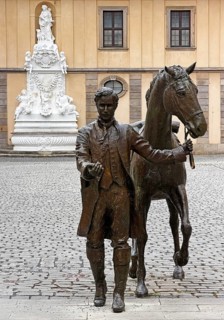 Life-size bronze sculpture, equestrian statue of the late reading rider by Valerie Otte in the