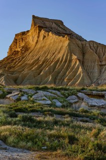 Bizarre rock formation in evening light in Bardenas Reales nature park Park, Navarra, Spain