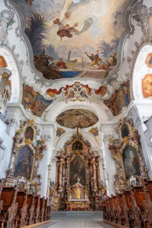 Magnificent baroque interior with ornate ceiling frescoes and stucco work by the Cathedral of Our