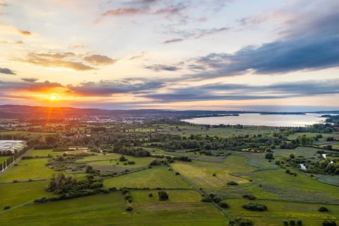 Morning atmosphere on Lake Constance. Sunrise in the Zeller Aachried nature reserve. aerial view.