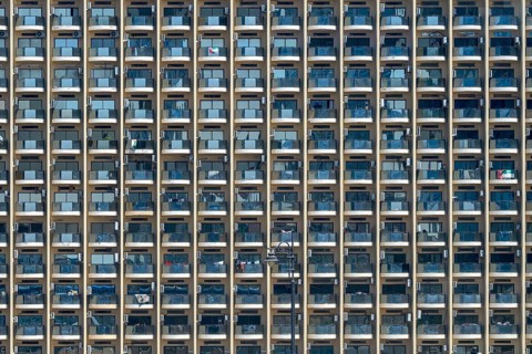 Apartment block with balconies and air-conditioning units, Dubai, United Arab Emirates, UAE