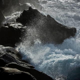 Thundering surf from the Atlantic Ocean on the rocky coast in San Sebastian, Basque Country, Spain