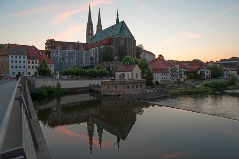 Late Gothic St. Peter's Church, in front the Neisse and the Old Town Bridge in the evening light,