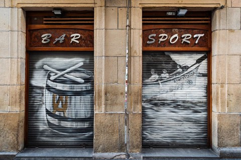 Typical Spanish art graffiti at a bar in the old town of San Sebastian, Spain