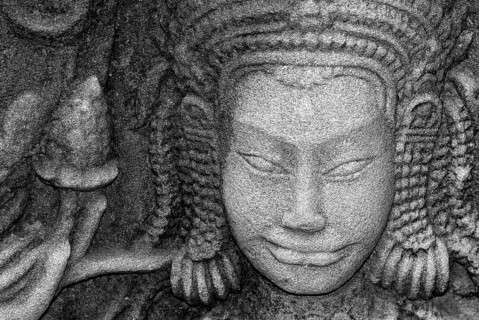 Stone Buddha, head, wall, Khmer, Angkor Wat temple, Siam Reap, Cambodia