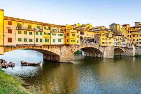 Ponte Vecchio bridge over Arno River at sunset, Florence, Tuscany, Italy