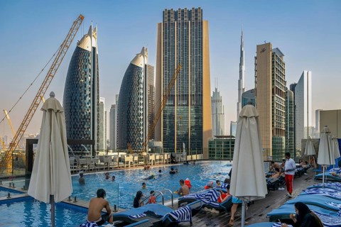 Swimming pool with view of Park Towers, The Index, Burj Khalifa and Liberty House, Dubai, United