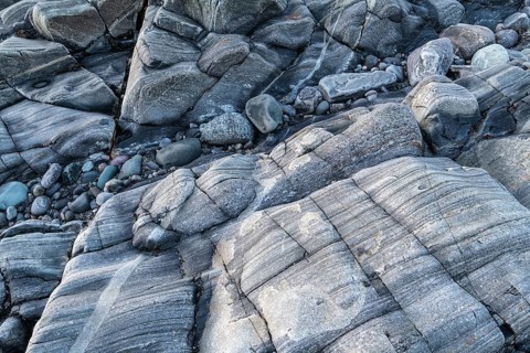 Rock structures on the coast, Söröya, Finnmark, Norway, February 2019