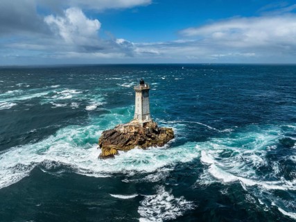 Aerial view of the historic Phare de la Vieille lighthouse, built from 1882 to 1887 on a rocky reef