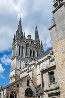 Historic west façade of the Gothic Saint-Maurice cathedral photographed in steep perspective from