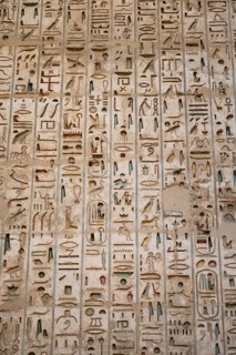 Close up details of the reliefs and hieroglyphs inside Medinat Habu, the ancient Egyptian Mortuary
