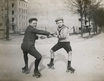 Berlin, skating, middle class, children, street, practice, help, free time, two boys with flat caps