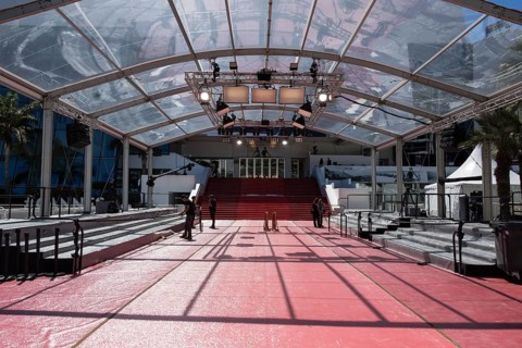 Staff preparing for the Red Carpet in front of the opening of the 79th Cannes International Film