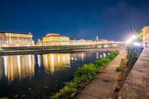 Promenade with arno river in front at blue hour, Florence, UNESCO World Heritage Site, Tuscany,