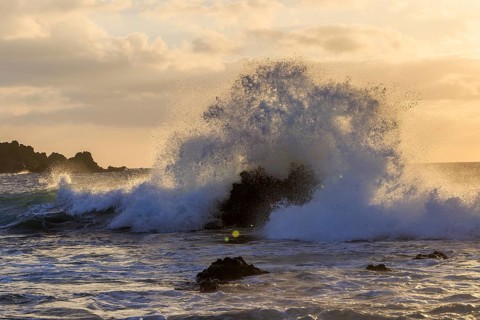 Lanzarote, Canary Islands, Spain, Europe, Los Hervideros, Dramatic waves hit rocky shores at sunset