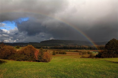 Rainbow in a landscape, Eckental, Middle Franconia, Bavaria, Germany