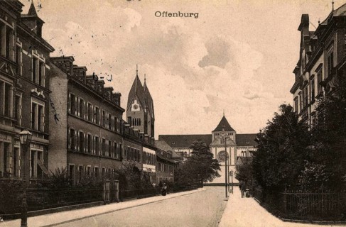 Friedrichstraße in Offenburg with the main Catholic church Holy Cross in the background,