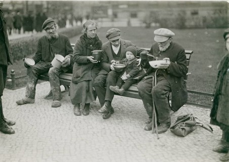 Berlin, unemployed people, beggars, soups, poverty, hunger, group of people sitting on a bench