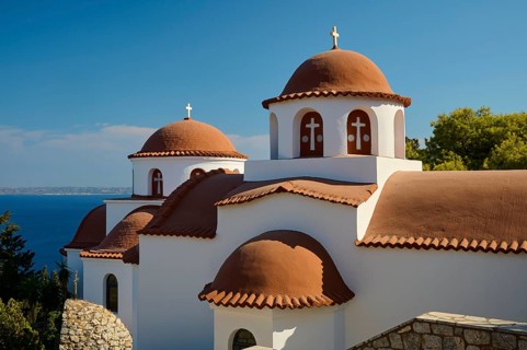 Agiou Sarvas monastery, white church with brown domes and crosses in front of a seascape, Pothia,