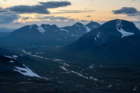 View over the Ruohtesvagge valley to the Akka massif and Mount Nijak, Sarek National Park, Laponia