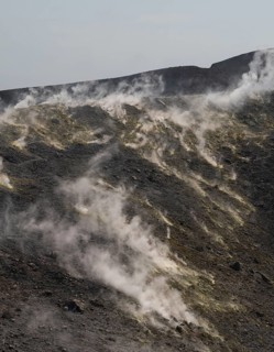 Crater rim, sulfur, sulfur vapors rise, Vulcano, Aeolian or Lipari Islands, Sicily, southern Italy,