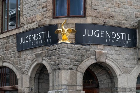 Entrance area with golden swan, symbol of the former swan pharmacy, today Museum Jugendstilsenteret