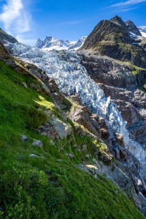 Picturesque high-alpine mountain landscape with Lower Eismeer glacier, hike to Schreckhornhütte,