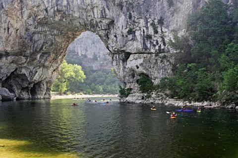 Canoes on the Ardèche river, above the Pont d'Arc rock gate, Ardèche Gorge, Gorges de l'Ardèche,