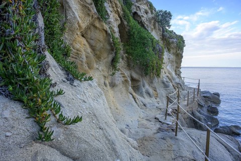 Road along the coast with beautiful rock formations to, Capo Sant Andrea, Marciana, Livorno